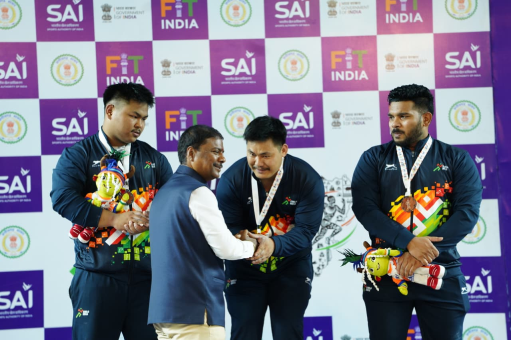खेलो इंडिया ट्राइबल गेम्स 2026: वेटलिफ्टिंग स्पर्धा में अरुणाचल पुरुष और असम महिला वर्ग में ओवरऑल चैम्पियन